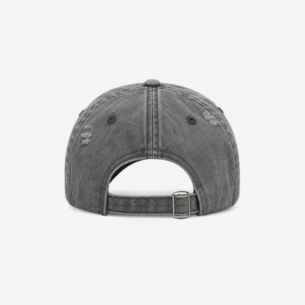 Back view of a washed grey baseball cap with an adjustable buckle strap