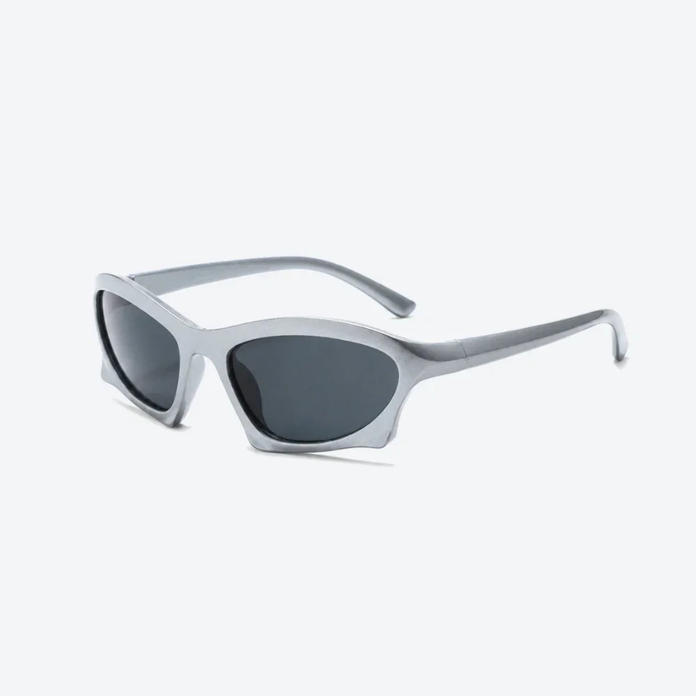 VYSER silver cat-eye sunglasses with dark gray lenses, sleek streetwear style frames.