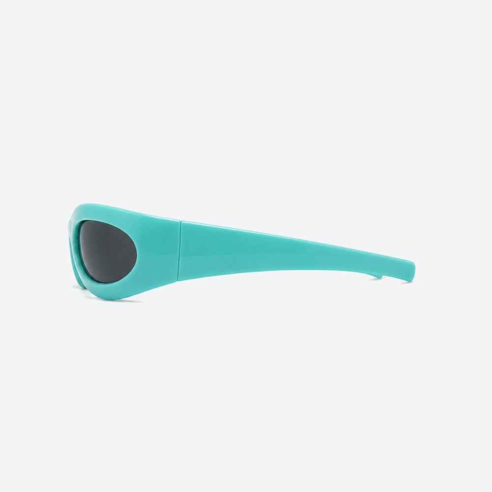 VYSER Turquoise sunglasses with black lenses on a white background