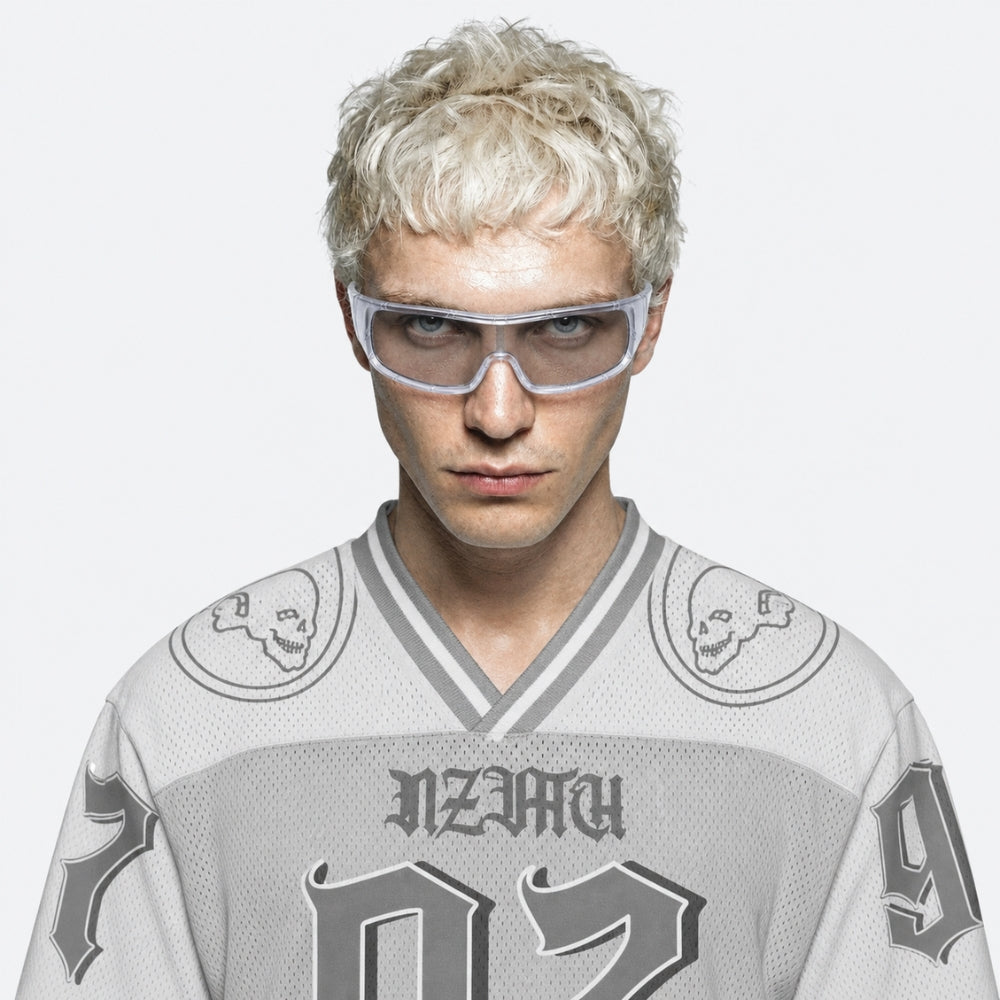 Person wearing a gray sports jersey with black designs and VYSER White sunglasses on a white background