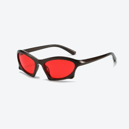 VYSER angular black acetate sunglasses with bold red lenses, modern streetwear style.