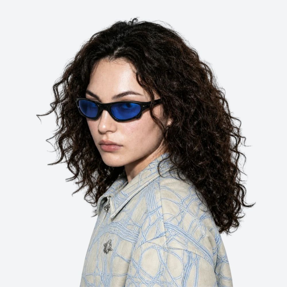 VYSER Black sunglasses with blue-tinted lenses on a white background