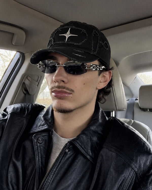 frameless look is seriously slept on. the sunglasses + cap combo goes crazy, and these shades pul...