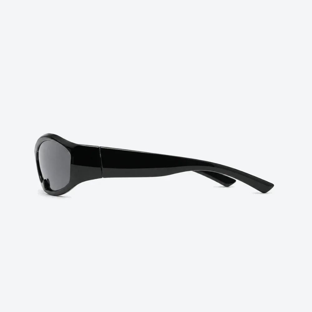 VYSER black glossy oversized sunglasses with dark lenses, minimalist streetwear style.